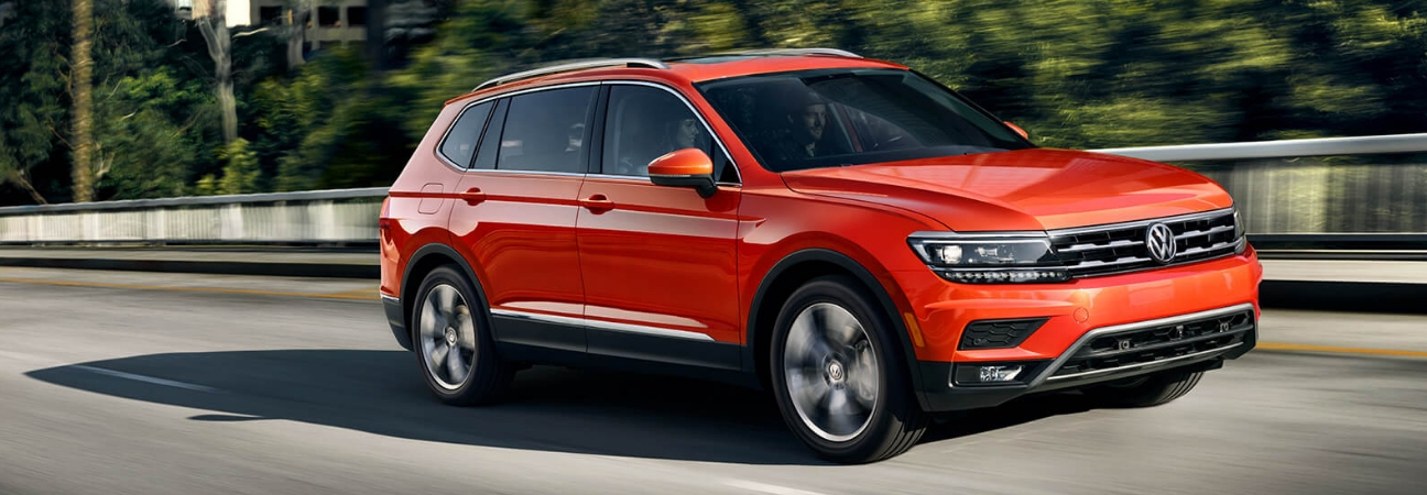 Volkswagen Tiguan driving down road